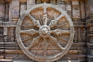 Fototapeta na wymiar Puri, Odisha/ India - June 19 2022: Chariot crafted on the wall of Konark Sun Temple, An ancient architecture Marvel of Eastern India at Odisha, Puri.