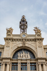 Fototapeta na wymiar old clock tower with bell in europe