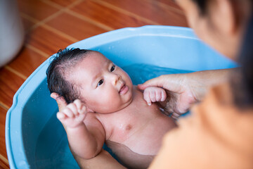 little girl  bathing in the tub