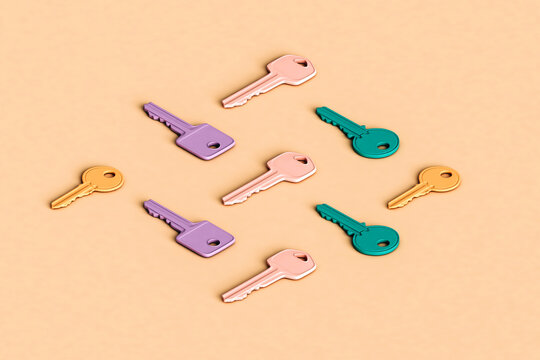 Colorful different keys on a pink background