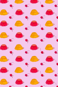 Seamless pattern of jelly pudding and red cocktail cherries