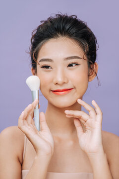 Portrait of beautiful girl smiling looking at camera.