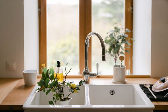 farmhouse kitchen sink with flowers