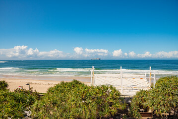 Scenic beach view in summer time on blue sky day. 