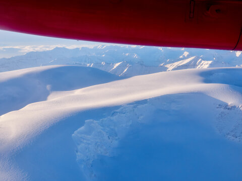 Greenland snowy Arctic winter aeroplane airplane window passenger view