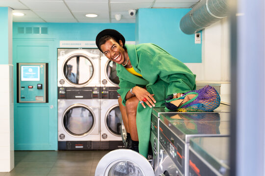 Cool black man enjoying in laundry