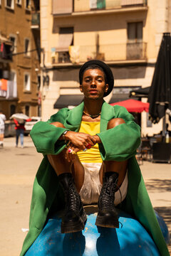 Serene cool man on boll at city portrait
