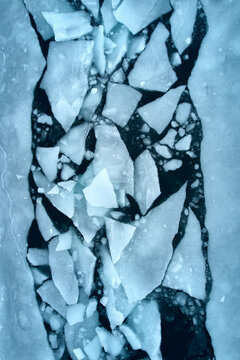 Greenland winter aerial view: sea ice fragments, Arctic global warming