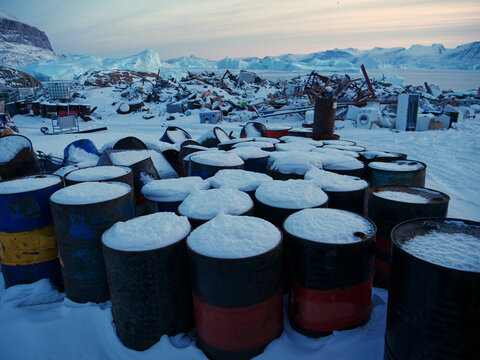 Greenland garbage dump, decaying oil drums for fossil fuels