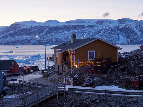 Greenland flag, Christmas lights - small Arctic Circle town mid winter