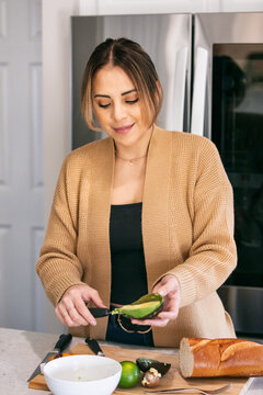 Kitchen: Scooping Out Avocado From Skin