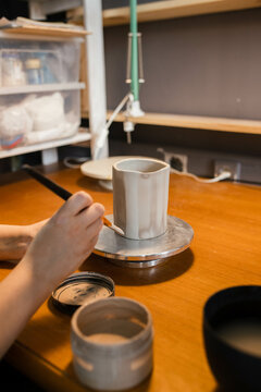 Coating the finished ceramic product with paint