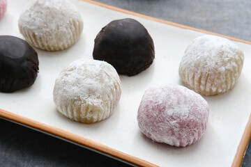 Mochi dessert with peanut paste filling, sweet food
