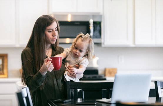 Mother Tries To Work WIth Children Around