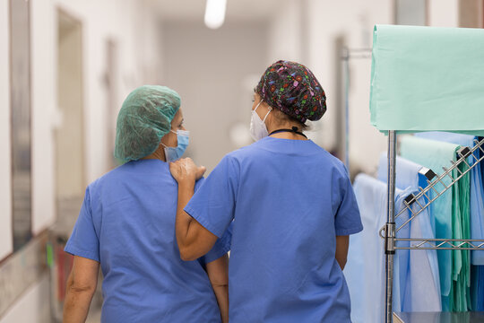 Confident nurse friends