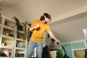 Man using controllers of VR headset