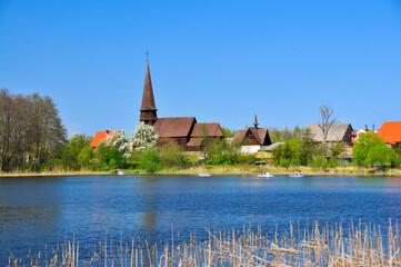 Obraz premium Wooden Church of the Elevation of the Cross. Lesno, Pomeranian Voivodeship, Poland