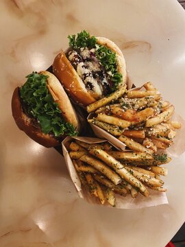 Two hamburgers and garlic french fries