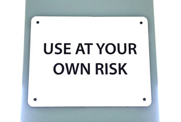 White Use at Your Own Risk Warning Sign