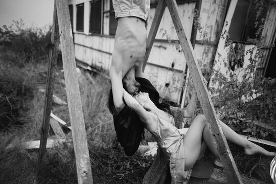 young couple kissing in a diffenrent way