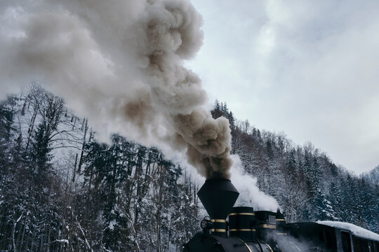 Steam engine in winter landscape