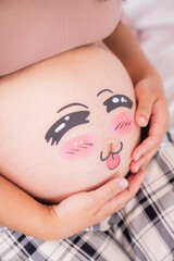 Photo of a pregnant woman in the studio