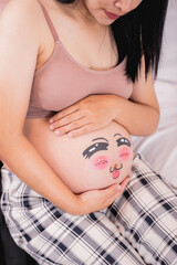 Photo of a pregnant woman in the studio