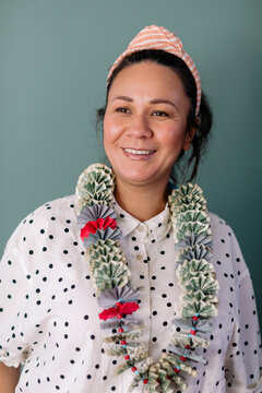 Woman wearing monei lei portrait