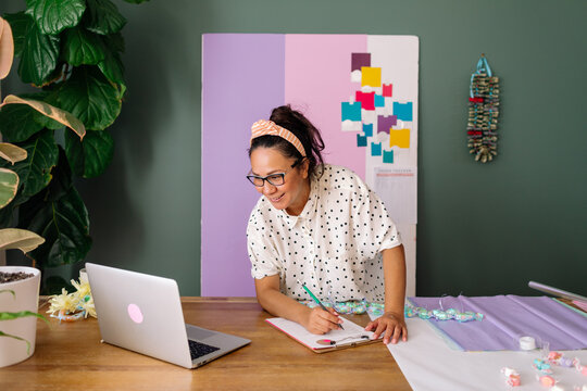Latina woman working in studio