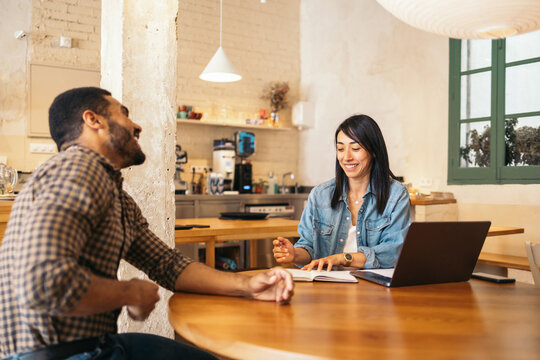 Business woman interviewing a candidate in an alternative workspace