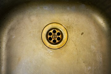 Old dirty metal sink background texture. Old iron kitchen sink.Old rusty sink.