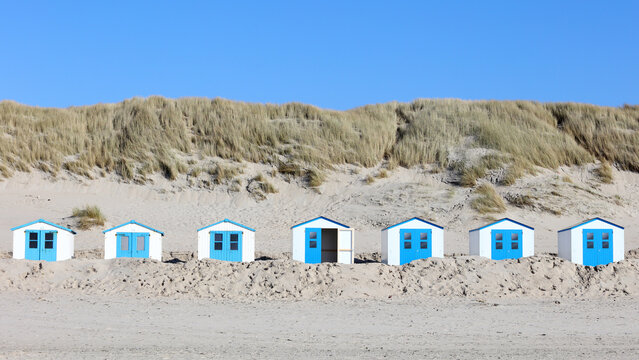 Cute cabins on a beach in Holland.