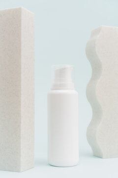 Studio Shot Of Lotion Dispenser With Abstract 3D Objects