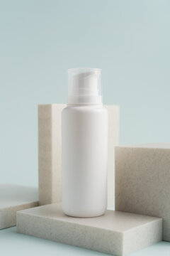 Beauty Product Plastic Bottle Studio Shot On The Blue Background