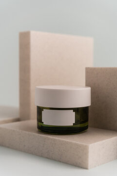 Studio Shot Of A Face Cream On The Blue Background 