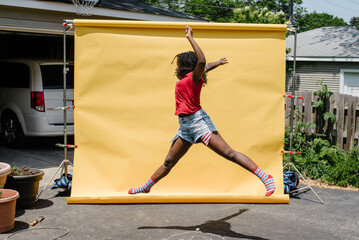 Girl jumping in the air