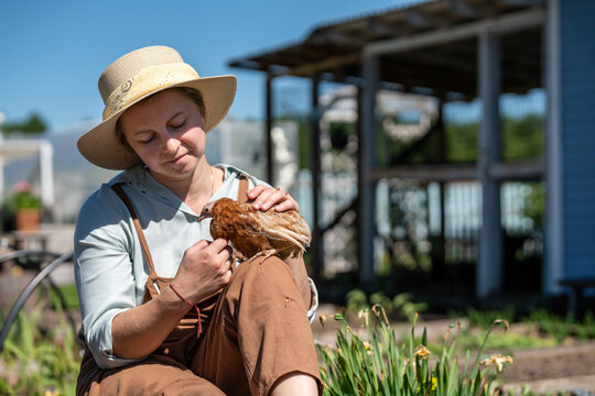 farmer with a hen