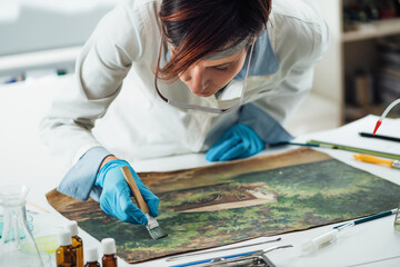 Restoring Old Oil Painting - obrazy, fototapety, plakaty