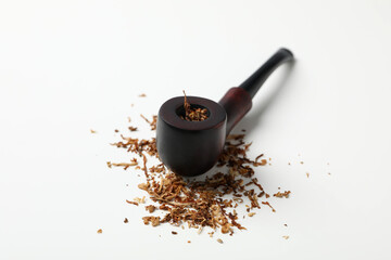 Smoking pipe with tobacco on white background