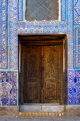 Carved handmade doors in the old city of Khiva.