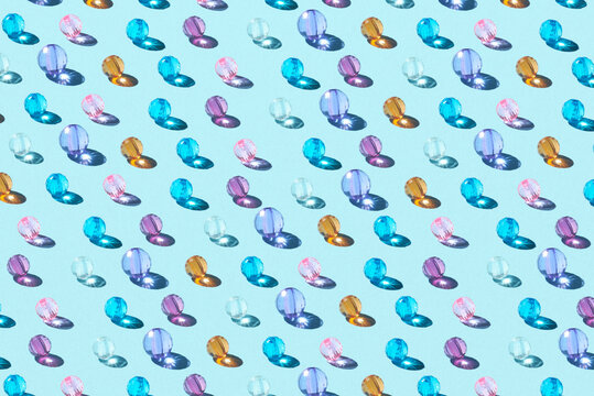 Seamless pattern of glass colored beads