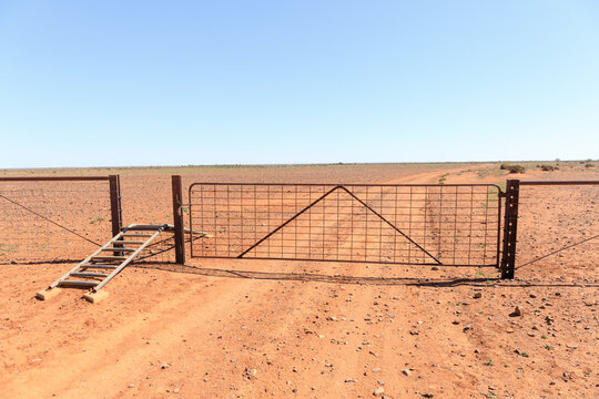 A gate on a cattle ranch during a drought. Outback South Australia