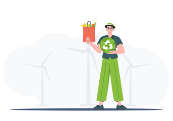 A full-length man is shown holding an EKO icon and a package of proper nutrition. Healthy food, ecology, recycling and zero waste concept. Flat trendy style. Vector. - obrazy, fototapety, plakaty