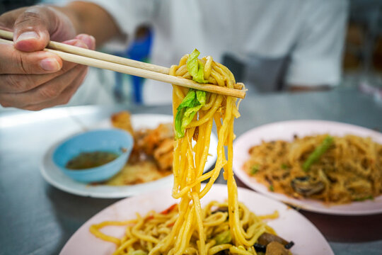 Soba noodles on chopsticks