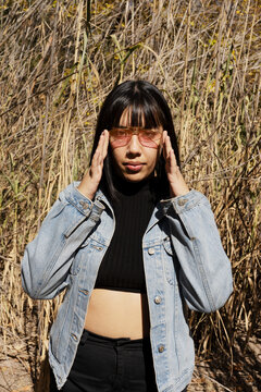 Portrait of woman outside in park