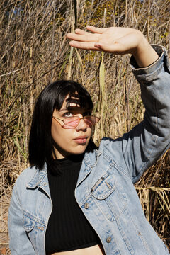 Portrait of woman outside in park