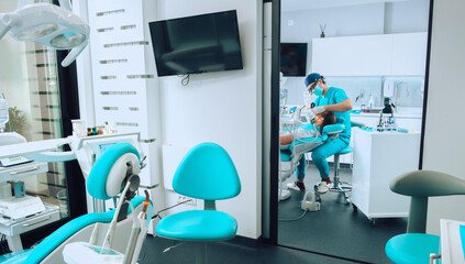 Dental Surgeon and patient on ordination