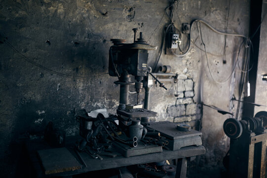 Factory Equipment In A Chinese Metalwork Shop In Anhui, China.