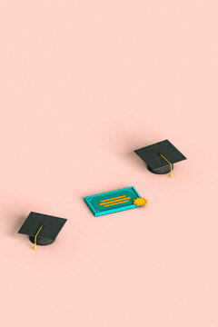 three graduation cap and diploma