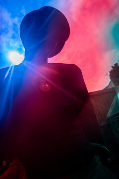 Mans silhouette with lens flare